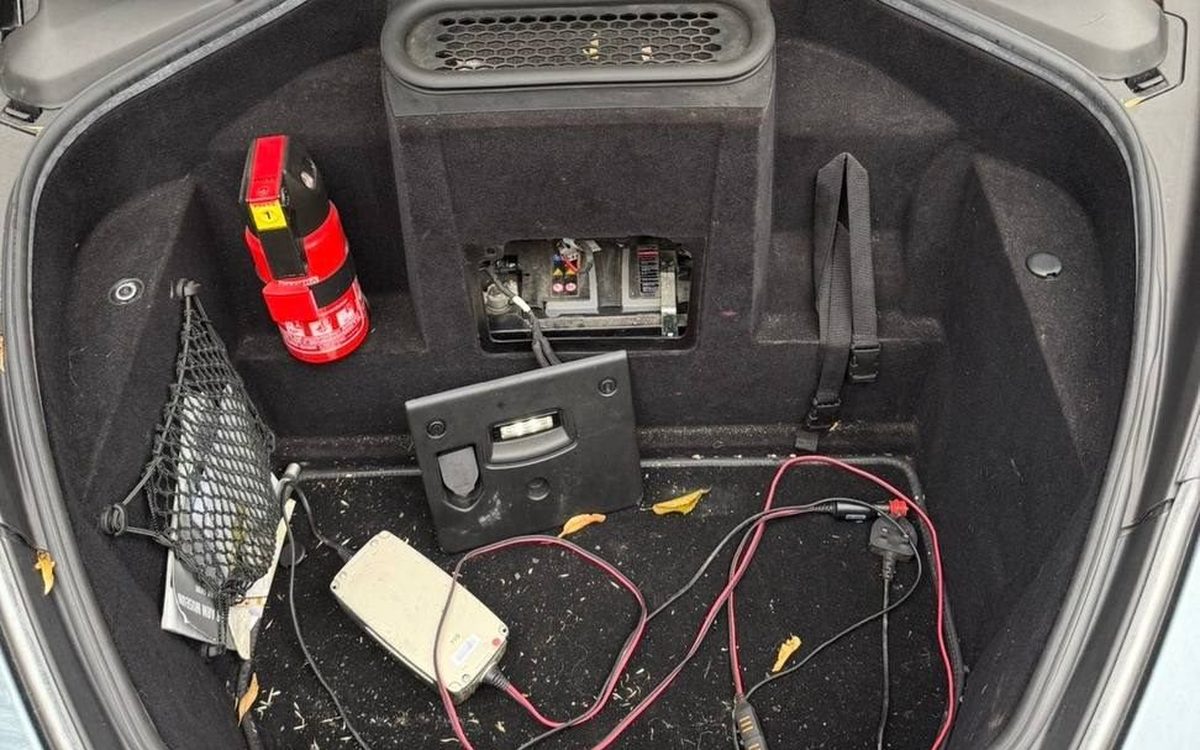 Before detailing a McLaren 720S front boot, full of loose cables and debris