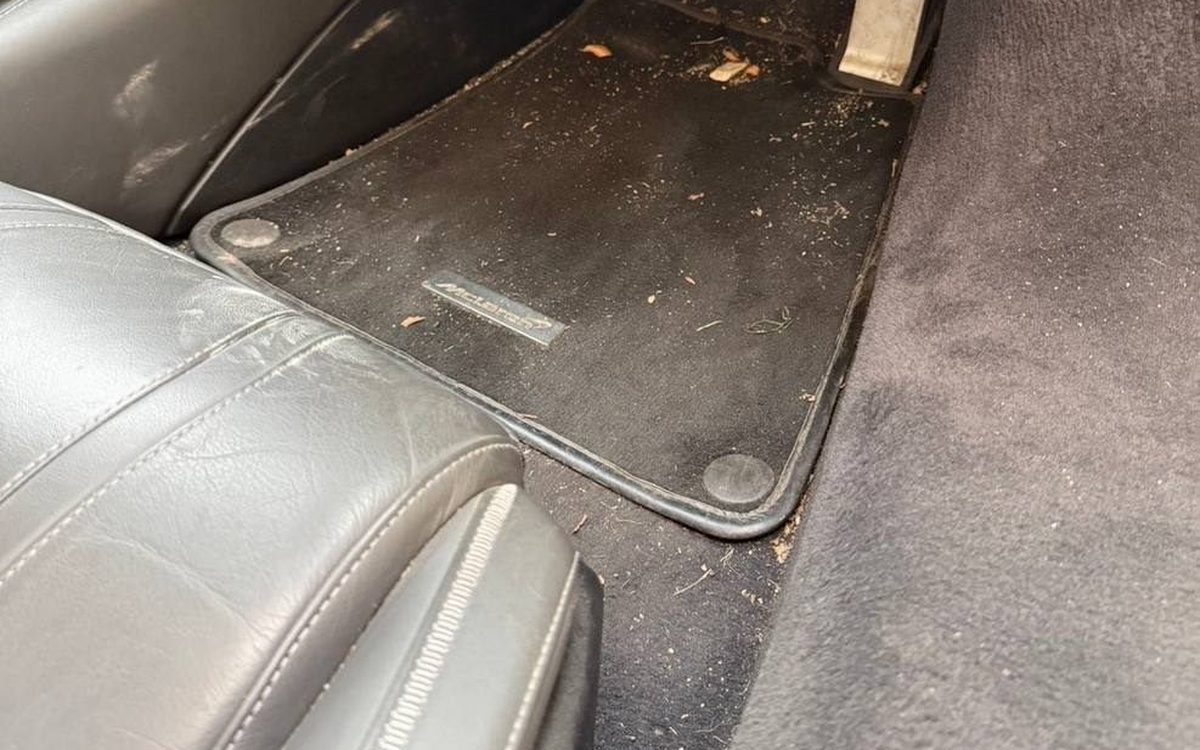 Before detailing a McLaren 720S footwell, covered in dirt and debris